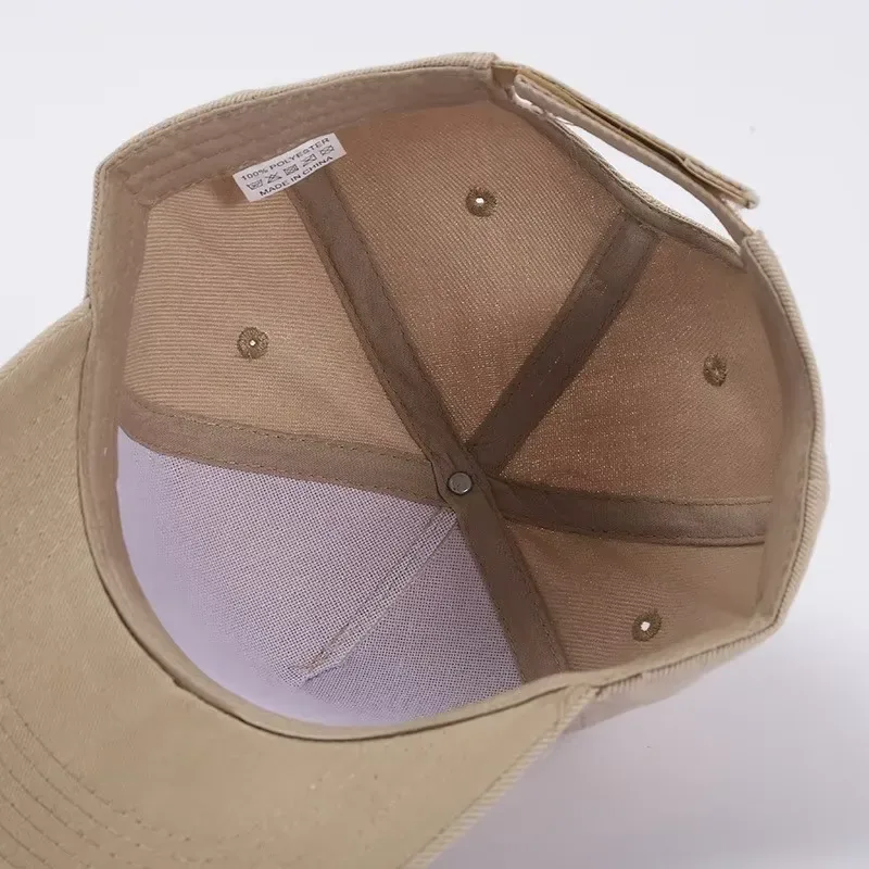 Close-up of a custom fitted hat front panel with embroidery