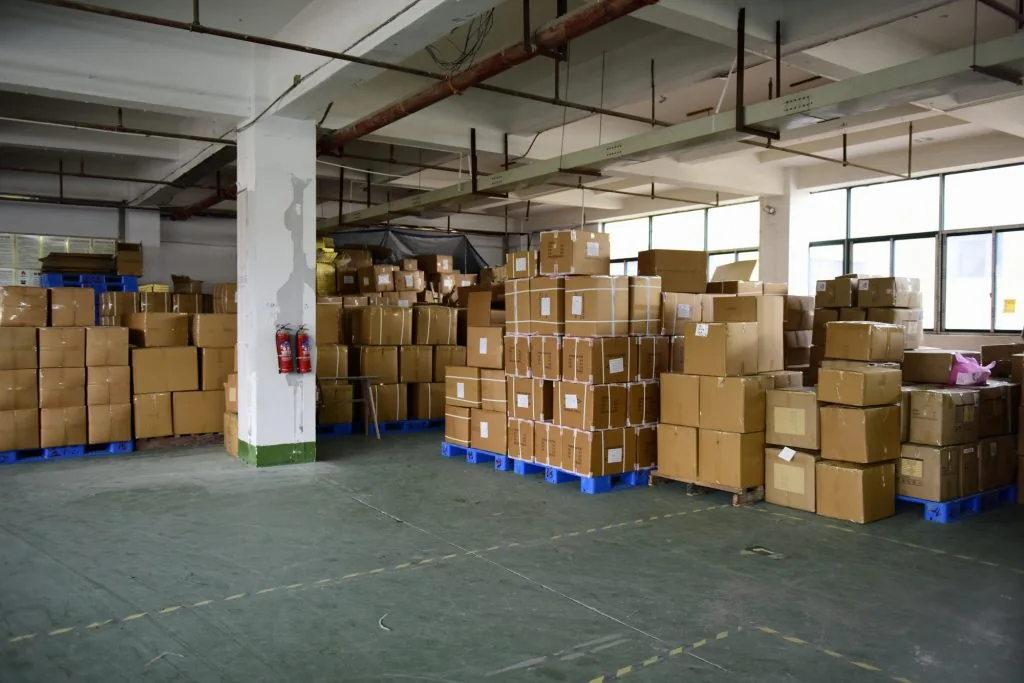 Finished goods staged in the warehouse by order number